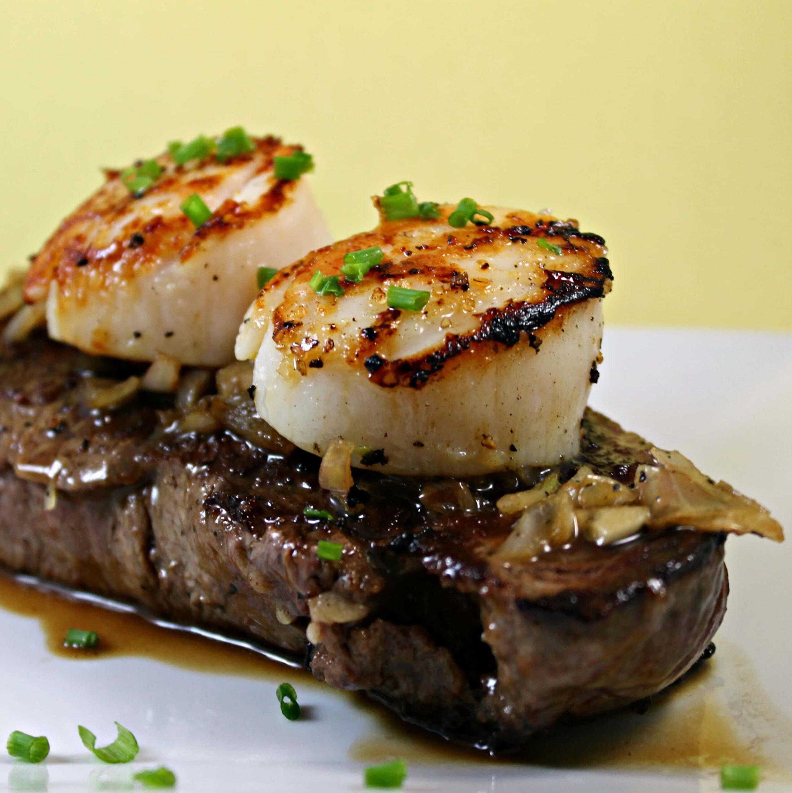 Seared Scallops and Steak with Manhattan Sauce